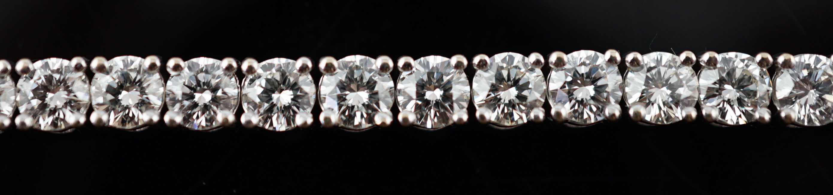 An 18k white gold and diamond line bracelet